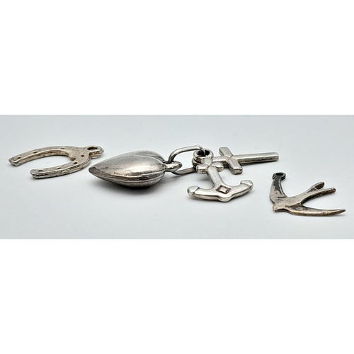 1374 - Three Silver Charms - lucky horseshoe, swallow, and faith, hope and love.