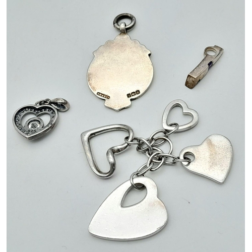 1395 - Four Silver Pendants - Various styles and designs. Please see photos for details. 23.28g total weigh... 