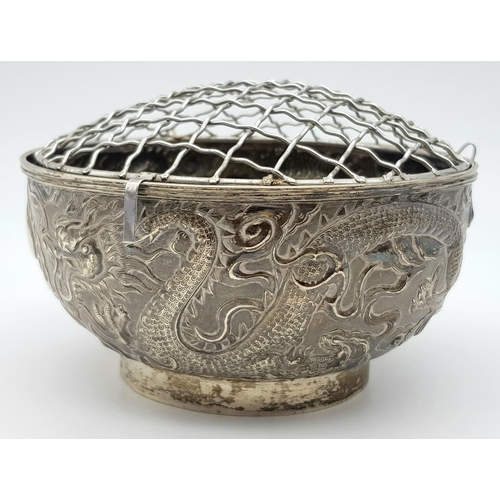 1396 - A late 19th, early 20th century small silver bouquet pot with dragon motif design by Wang Hing & Com... 