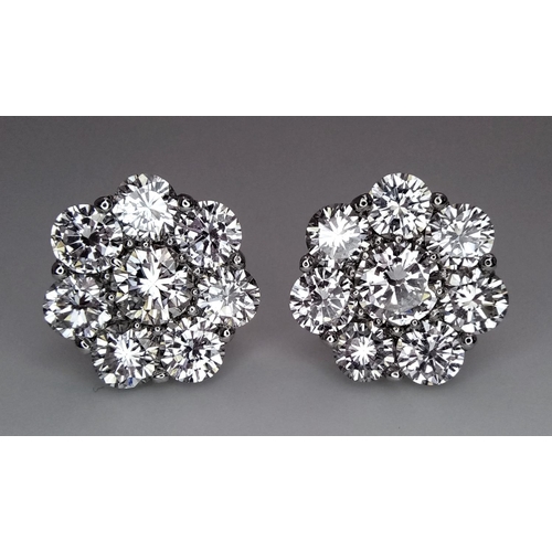 170 - A Stunning Pair of 900 Platinum Diamond Earrings. 5.74ctw of brilliant round cut VS2 diamonds in flo... 