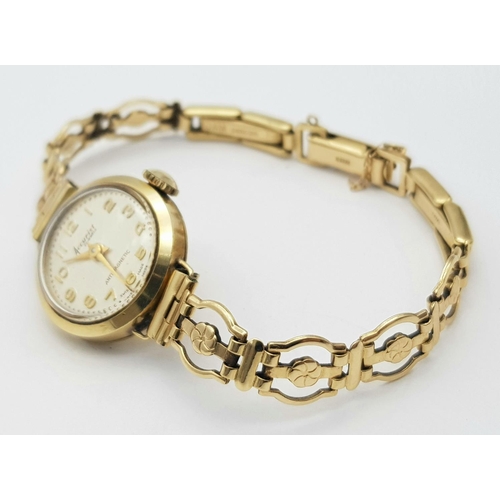 198 - A Vintage 9K Yellow Gold Mechanical Accurist Ladies Watch. 
9K gold bracelet and case. Works but bec... 