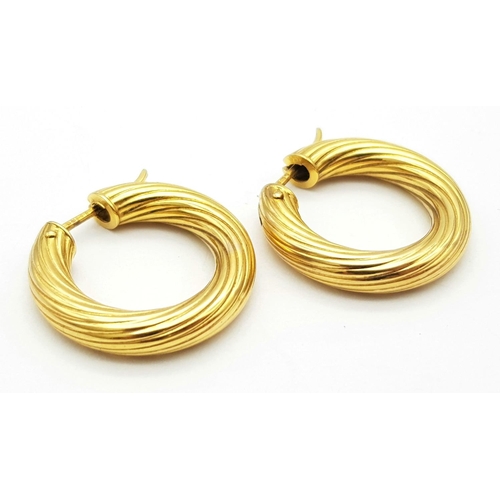 233 - A Pair of 9K Yellow Gold Creole Hoop Earrings. 2.5cm diameter. 4.4g weight.