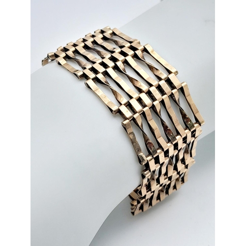 255 - A Vintage 9K Yellow Gold Gate Bracelet with Heart Clasp and Safety Chain. 18cm. 18.56g