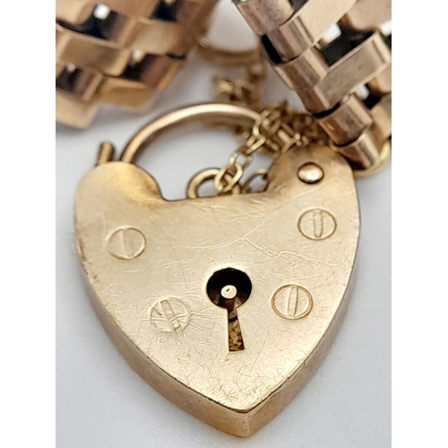 255 - A Vintage 9K Yellow Gold Gate Bracelet with Heart Clasp and Safety Chain. 18cm. 18.56g