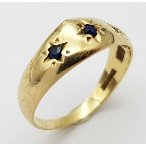 261 - A Vintage 9K Yellow Gold Gypsy Set Sapphire Ring. Size I. 1.27g total weight.