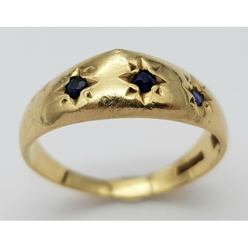 261 - A Vintage 9K Yellow Gold Gypsy Set Sapphire Ring. Size I. 1.27g total weight.