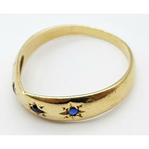 261 - A Vintage 9K Yellow Gold Gypsy Set Sapphire Ring. Size I. 1.27g total weight.