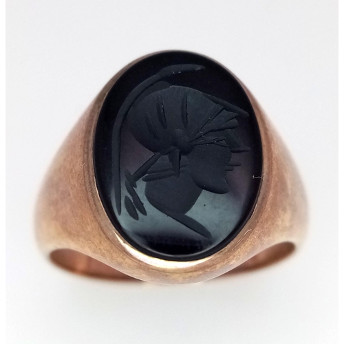 262 - A Vintage 9K Yellow Gold Signet Ring with Black Onyx Intaglio Decoration. Size T. 8.3g total weight.