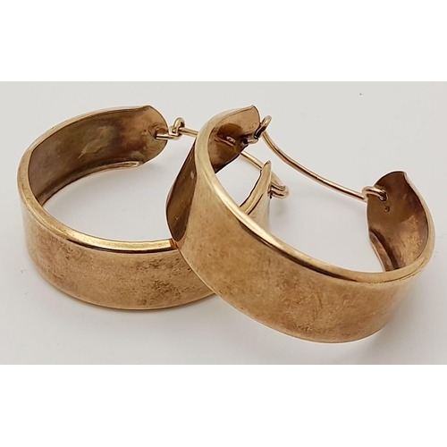 269 - A Vintage Pair of 9K Gold Wide Banded Hoop Earrings. 1cm width. 6.3g total weight.