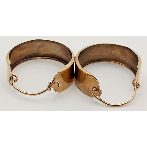 269 - A Vintage Pair of 9K Gold Wide Banded Hoop Earrings. 1cm width. 6.3g total weight.