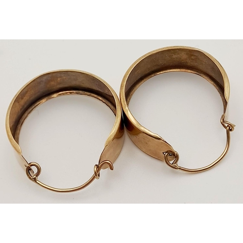 269 - A Vintage Pair of 9K Gold Wide Banded Hoop Earrings. 1cm width. 6.3g total weight.