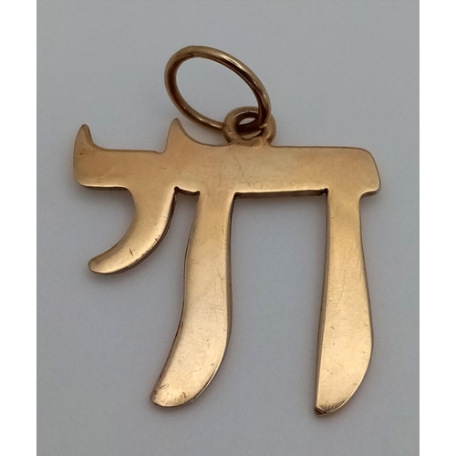 352 - A 9K Yellow Gold Chai Symbol Pendant. 3cm. 2.85g