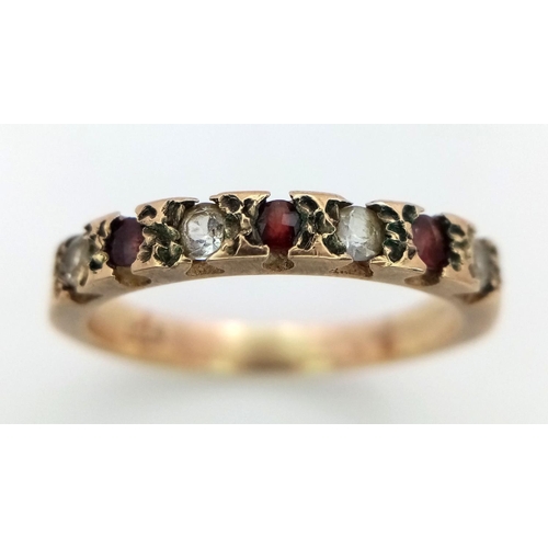 366 - A Vintage 9K Yellow Gold White Stone and Garnet Ring. Size M 1/2. 2.65g total weight.