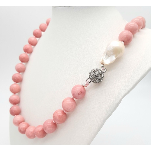 380 - A Luscious Pink Rhodochrosite Beaded Necklace with a Baroque Pearl Interrupter and Glitterball Clasp... 