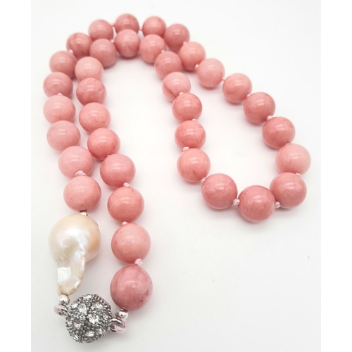 380 - A Luscious Pink Rhodochrosite Beaded Necklace with a Baroque Pearl Interrupter and Glitterball Clasp... 