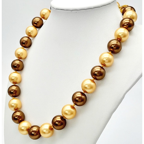 387 - A Rich Gold Tone South Sea Pearl Shell Beaded Necklace. Large 14mm shell beads. 42cm necklace length... 