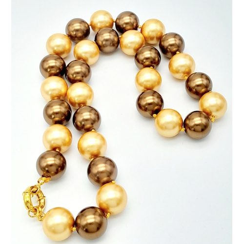 387 - A Rich Gold Tone South Sea Pearl Shell Beaded Necklace. Large 14mm shell beads. 42cm necklace length... 