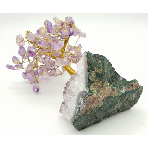 400 - A Beautiful Amethyst Tree. An amethyst cluster base with a yellow metal tree decorated with polished... 