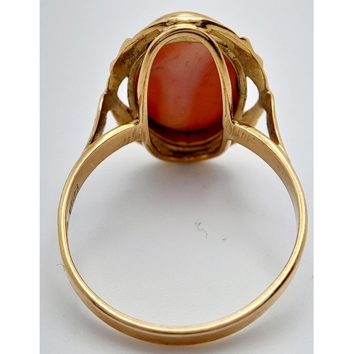 86 - A Beautiful Vintage 18K Yellow Gold Pink Coral Ring. Pastel coloured coral cabochon. Size P. 4.1g to... 