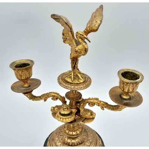 311 - An Heavy Gilt on Marble Base, Ormolu Candelabrum with Stork Detail. Weight 2.27 kilos. 29cm Height.