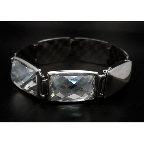 367 - A Rhodium Plated, Swarovski Crystal Set Bracelet. 20cm Length. Model Nirvana. Complete with Box and ... 