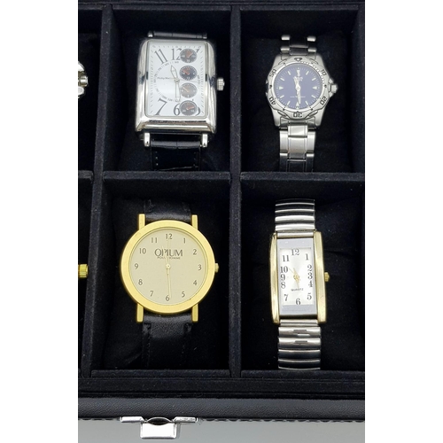 521 - A Black Leather 20 Watch Display Box Containing Ten Vintage and Later Sports Fashion Quartz Watches.... 