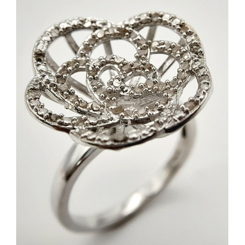 676 - A Sterling Silver Diamond Set Bowl Shape Ring Size P. Crown Measures 2cm Wide and is set with round ... 