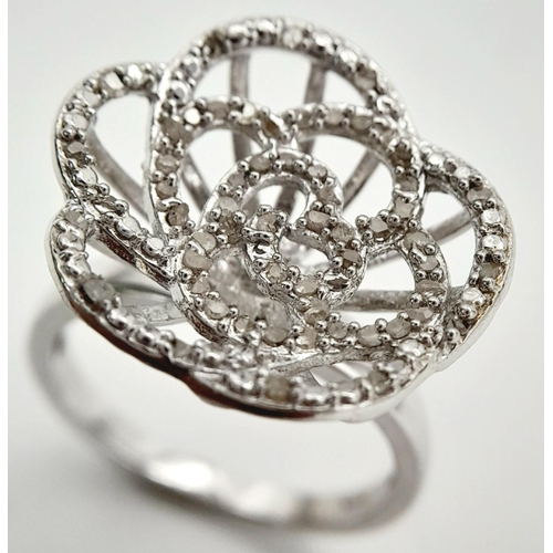 676 - A Sterling Silver Diamond Set Bowl Shape Ring Size P. Crown Measures 2cm Wide and is set with round ... 