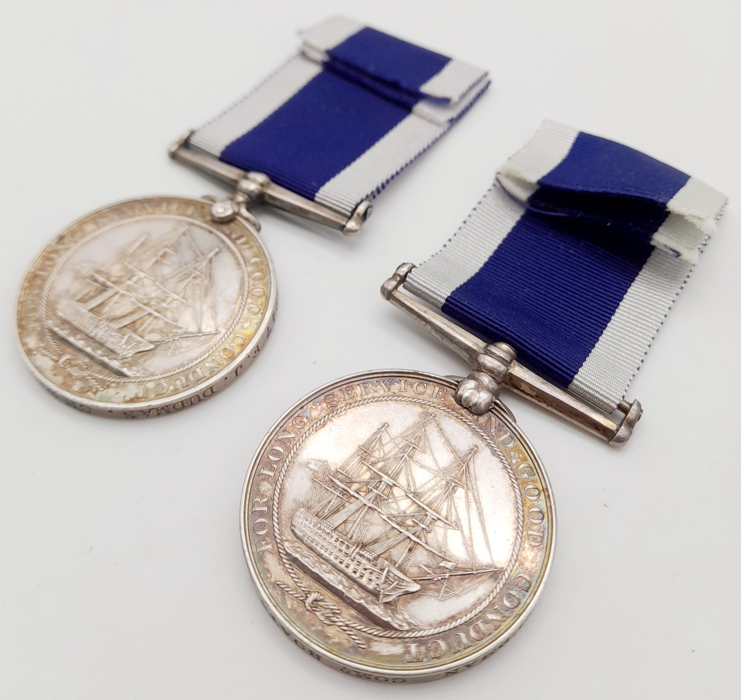 A family pair of Royal Navy Long Service & Good Conduct Medals: Father ...