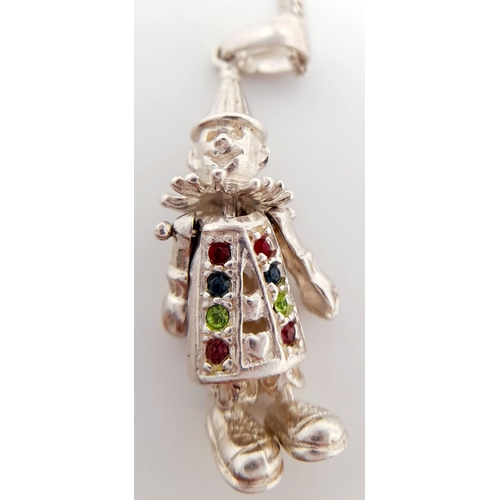 1654 - A 925 Articulated Clown Pendant on a Silver Chain. 3.5cm and 42cm.