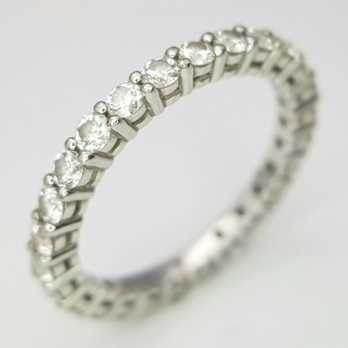 18 - A Tiffany and Co. 950 Platinum and Diamond Full Eternity Ring. Size I 1/2. 2.6g total weigh. Comes w... 