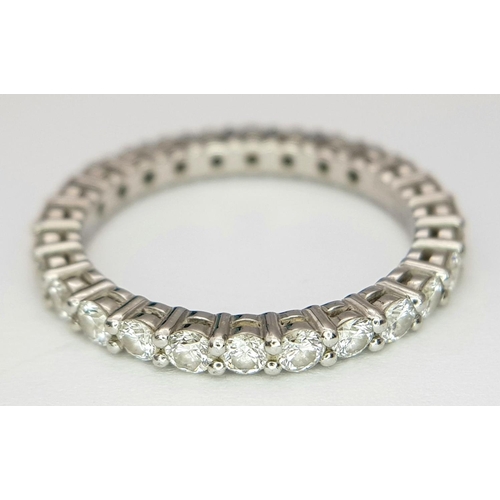 18 - A Tiffany and Co. 950 Platinum and Diamond Full Eternity Ring. Size I 1/2. 2.6g total weigh. Comes w... 