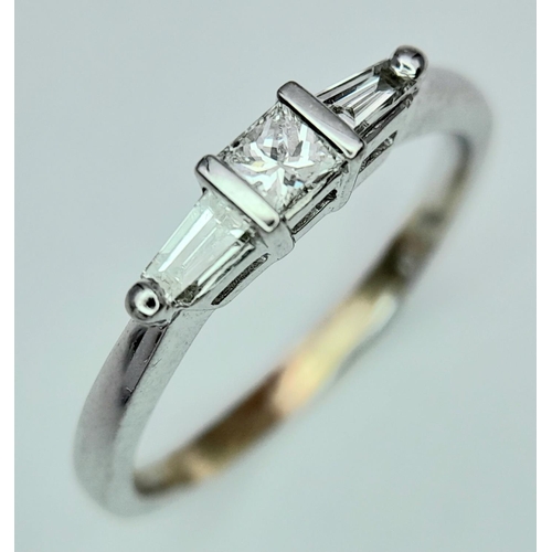 215 - 18K WHITE GOLD DIAMOND PRINCESS CUT SINGLE STONE WITH TAPPERED BAGUETTE ACCENT DIAMOND SHOULDERS 0.3... 