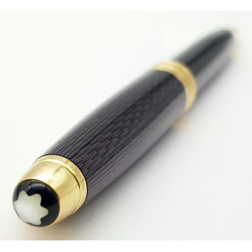 319 - A Montblanc Meisterstuck Ballpoint Pen. Very good condition, in working order. Black/violet lacquer ... 