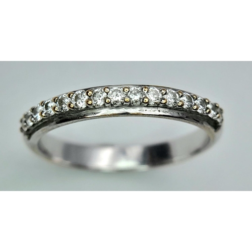 327 - 18K WHITE GOLD ( TESTED ) DIAMOND BAND RING 0.30CT 2.5G SIZE M

ref: PERS 3012