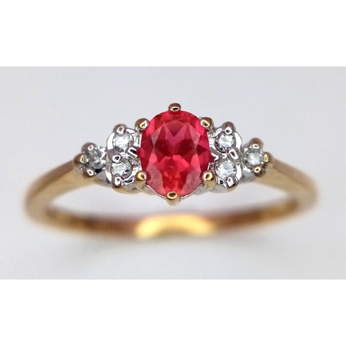 437 - 9K Yellow gold Diamond and Red Stone Ring, 0.06ct diamond, 2.1g total weight, size R 1/2

ref:  8418... 