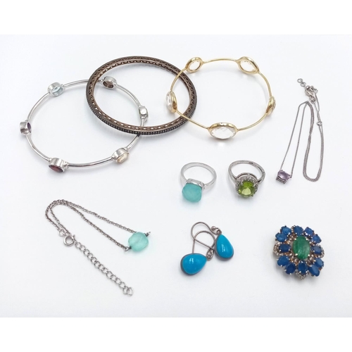 522 - A Selection of Nine Silver Items: 3 x bangles, 2 x stone set Rings, 1 x pair of earrings, 2 x neckla... 