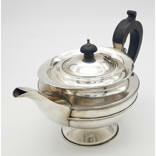 94 - A Vintage (1938) Sterlng Silver Teapot. Genie-Lamp-Esque  design with Bakelite handle. 24cm handle -... 