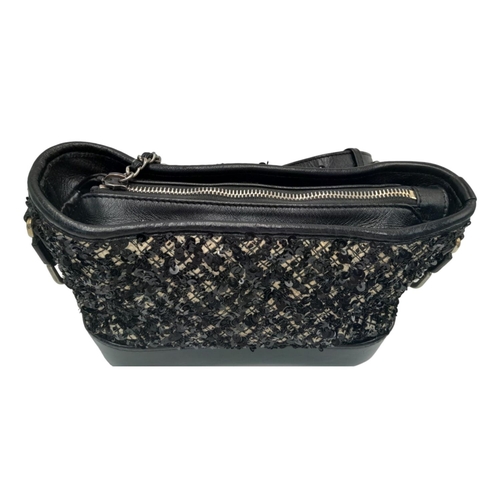 3 - A Chanel Black and Cream Sequin Gabrielle Bag. Leather, textile and sequin exterior with silver and ... 