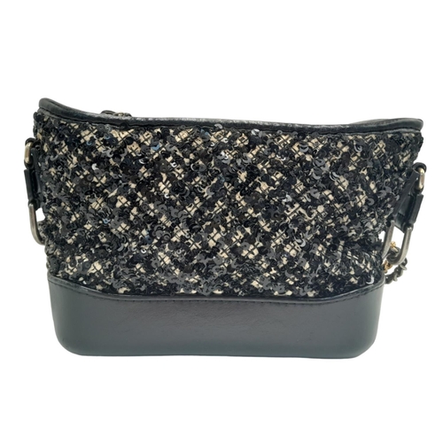 3 - A Chanel Black and Cream Sequin Gabrielle Bag. Leather, textile and sequin exterior with silver and ... 