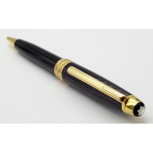 319 - A Montblanc Meisterstuck Ballpoint Pen. Very good condition, in working order. Black/violet lacquer ... 