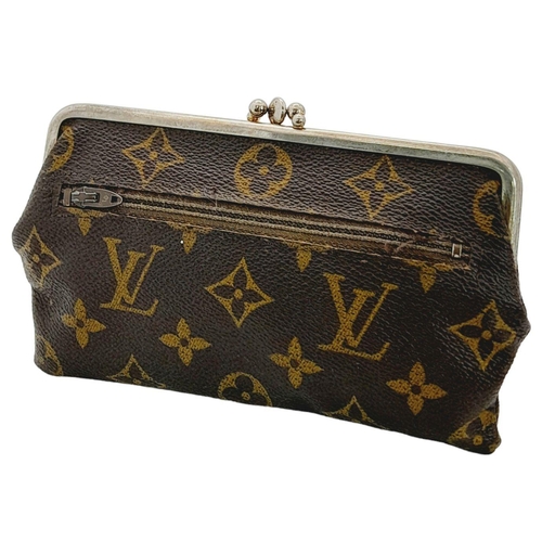 444 - A Vintage Louis Vuitton Coin Purse. Louis Vuitton x Saks Fifth Avenue collaboration. Monogram canvas... 