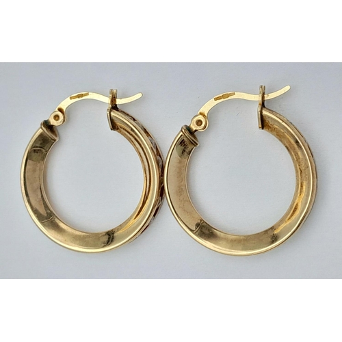 473 - 9K Yellow gold CZ Hoops, 3.4g total weight

ref: 1574I