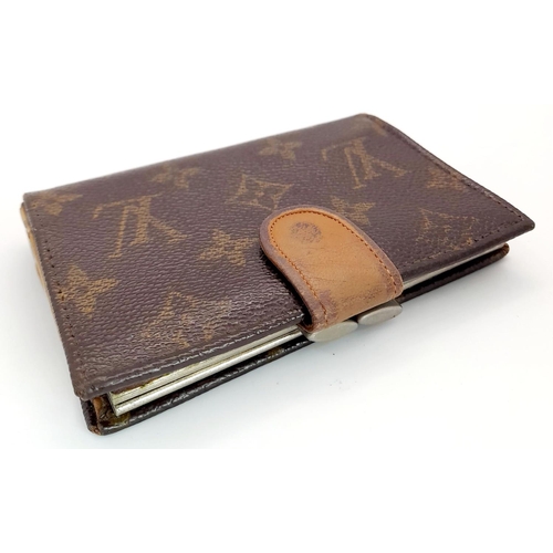 508 - A Vintage Louis Vuitton Wallet. Louis Vuitton x Saks Fifth Avenue Collaboration. Monogram canvas ext... 