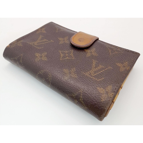 508 - A Vintage Louis Vuitton Wallet. Louis Vuitton x Saks Fifth Avenue Collaboration. Monogram canvas ext... 