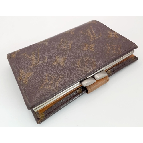 508 - A Vintage Louis Vuitton Wallet. Louis Vuitton x Saks Fifth Avenue Collaboration. Monogram canvas ext... 