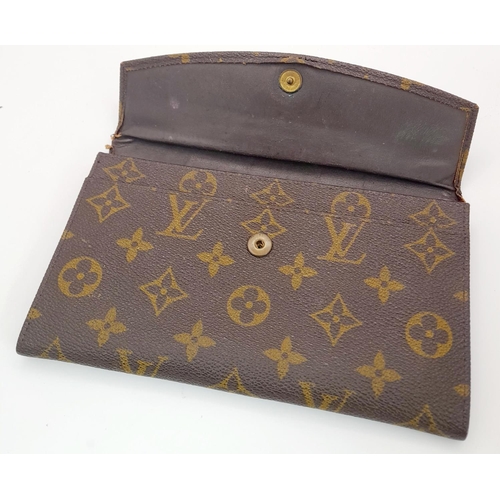 515 - A Vintage Louis Vuitton Envelope Purse/Wallet. Louis Vuitton x Saks Fifth Avenue collaboration. Mono... 