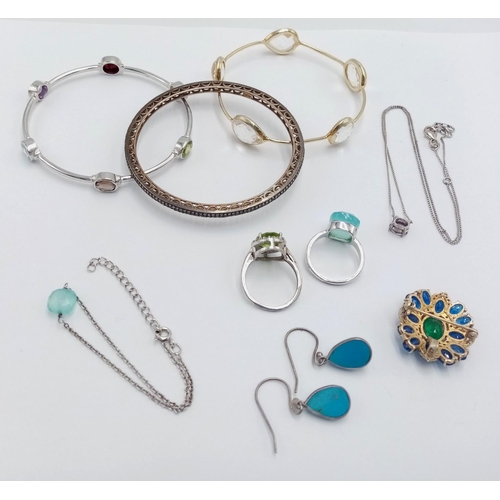 522 - A Selection of Nine Silver Items: 3 x bangles, 2 x stone set Rings, 1 x pair of earrings, 2 x neckla... 