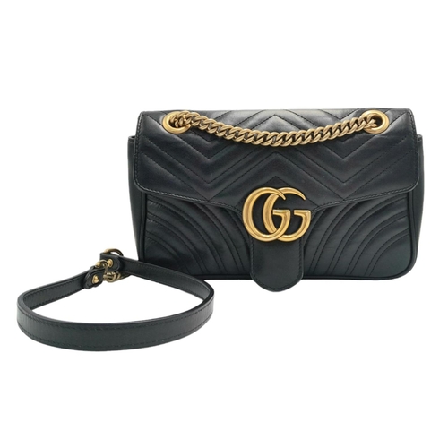 88 - A Gucci Black Marmont Flap Bag. Matelassé leather exterior with gold-toned hardware, chain and leath... 