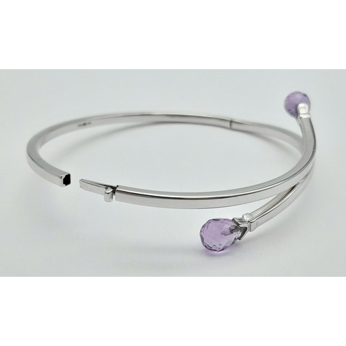 89 - 9K WHITE GOLD AMETHYST SET BANGLE 8.1G

ref: SC 3003